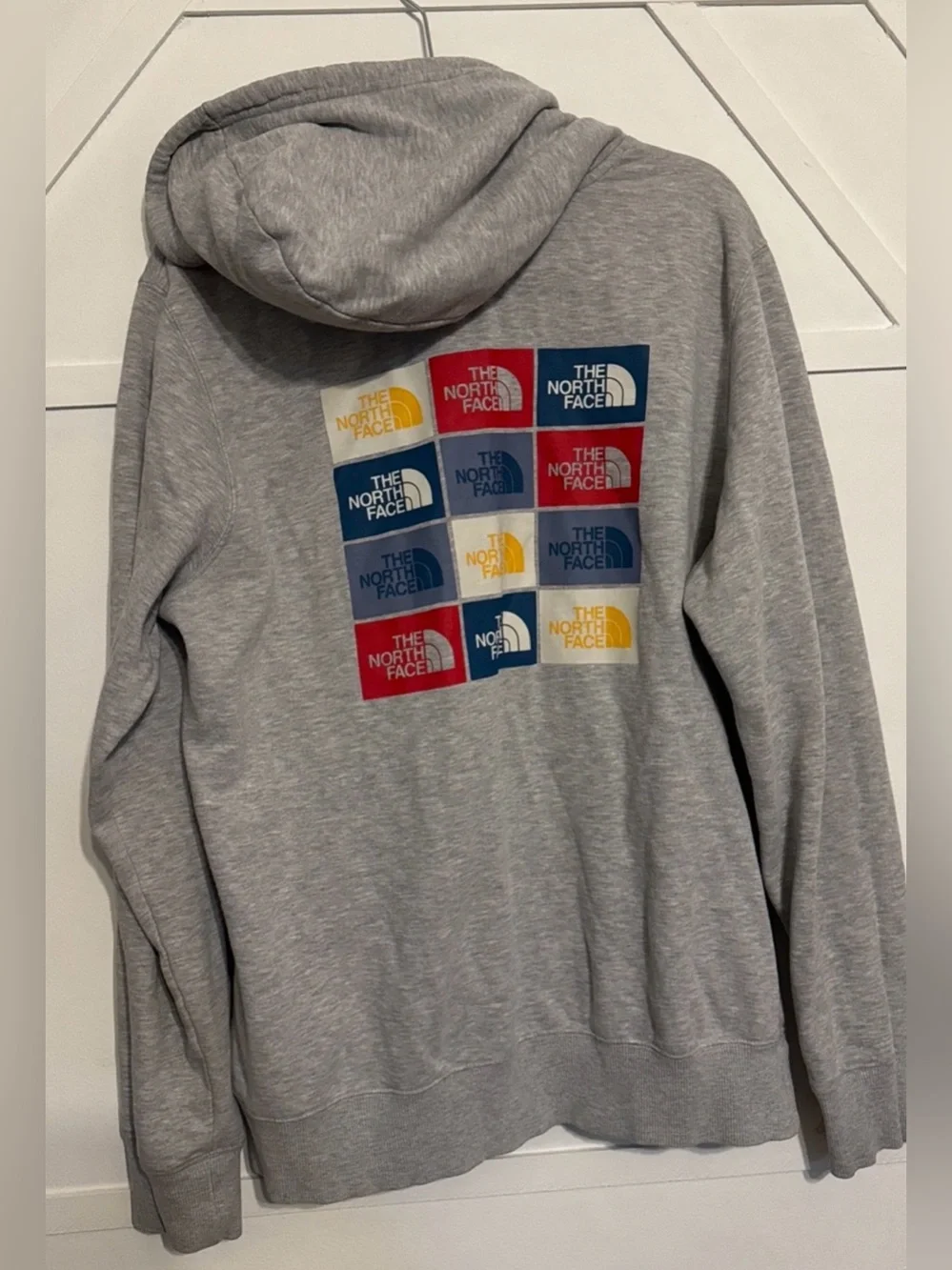 The North Face Men’s Heather Gray Pullover Hoodie with Navy Logo